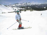 Larry comments on the skiing with a big grin!