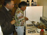 Brown panfrying Lake George trout as Stan supervises